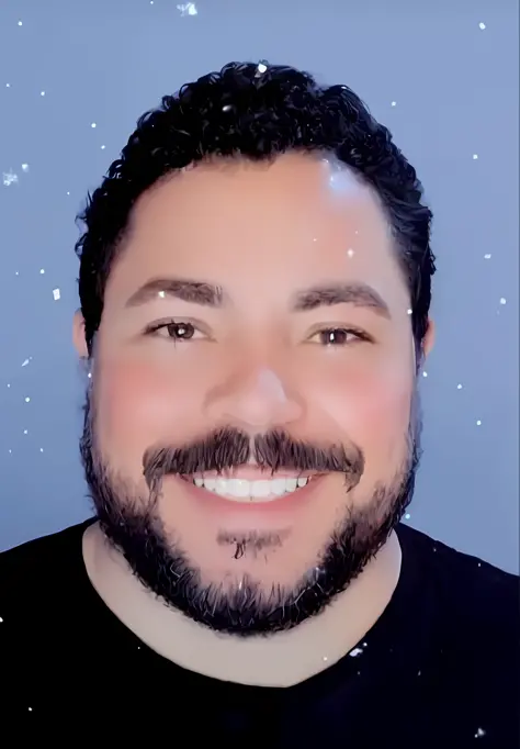 arafed man with a beard and a black shirt smiles at the camera, david rios ferreira, only snow in the background, glitter gif, d...