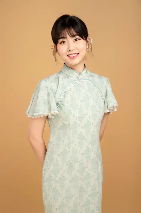 arafed asian woman in a green dress posing for a picture, cheongsam, wearing a blue qipao dress, in a blue qipao, chinese dress,...