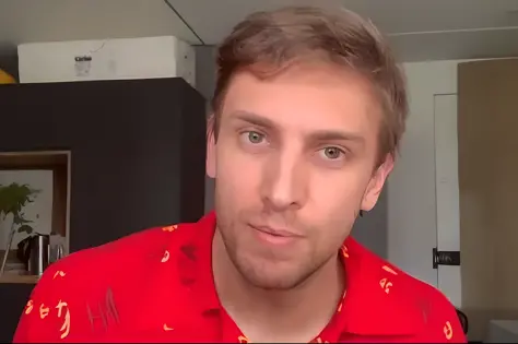 there is a man in a red shirt looking at the camera, light stubble with red shirt, h3h3, linus from linustechtips, twitch stream...