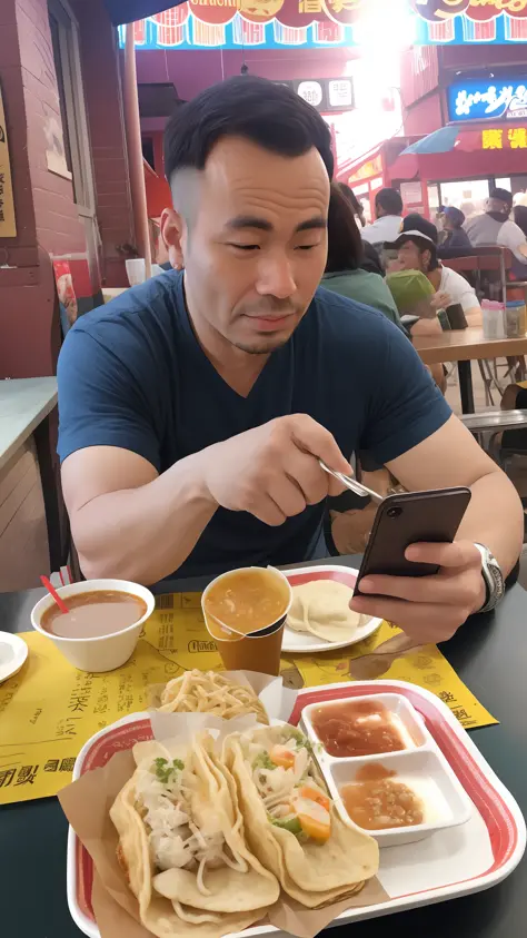 arafed man sitting at a table with a plate of food and a cell phone, looking at his phone, low quality photo, mukbang, candid sh...