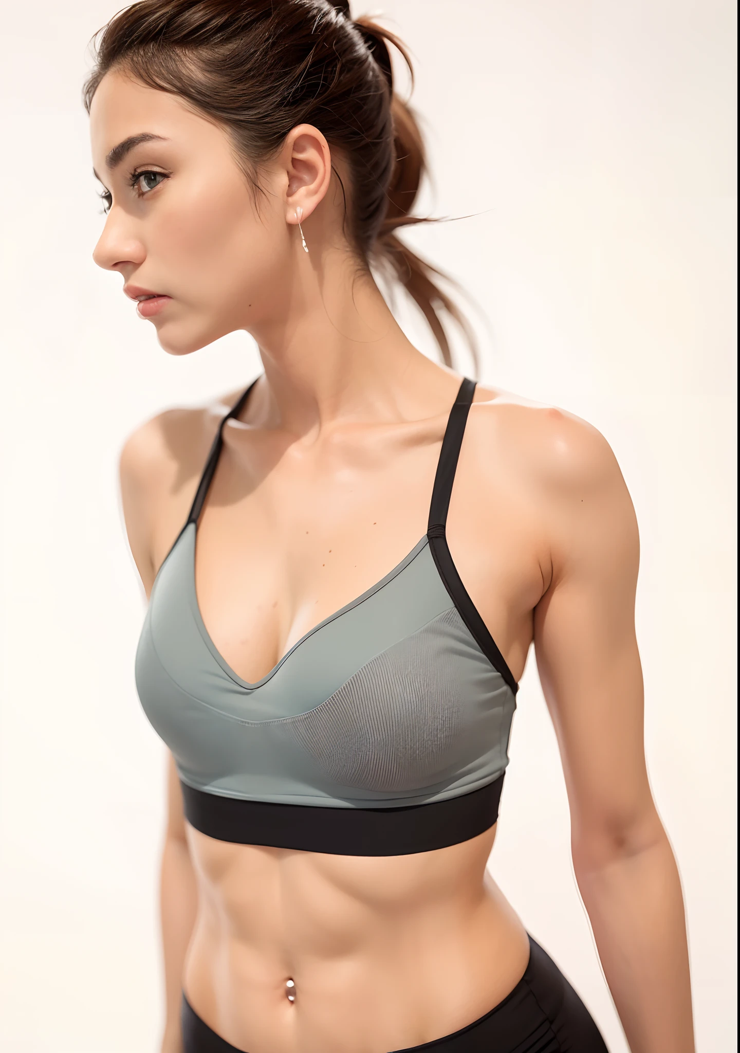 A closeup of a gorgeous woman in a sports bra top and shorts