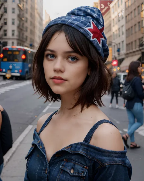 Photo of (jortega) posing in a flannel shirt and blue jeans with an American Flag around her shoulders and a red hat on her head...