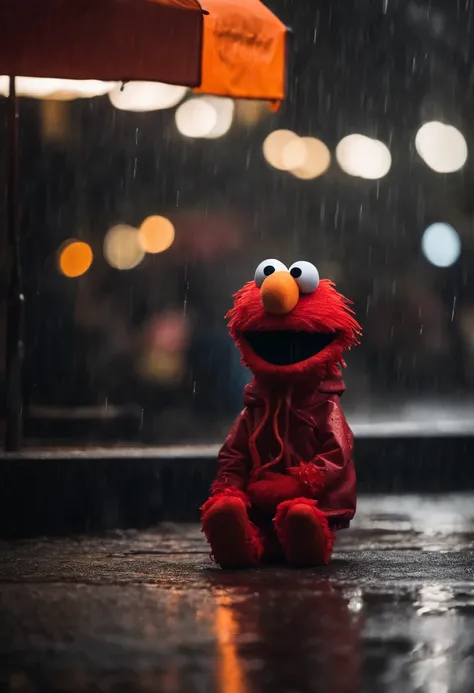 Elmo who is a red puppet with a orange nose is wearing a black hoodie ...