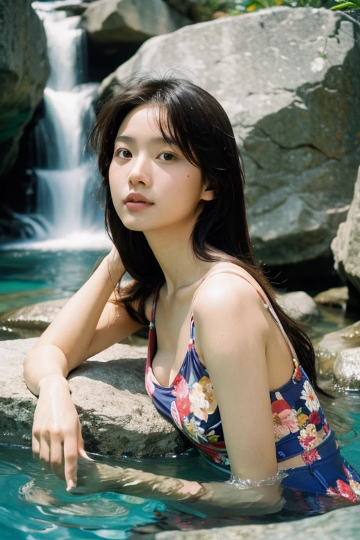 Portrait young MagMix Girl look at camera, long hair, floral one-piece swimsuit, waist, a shallow pool at the base of a waterfall, with water gently flowing around her, warm sunlight, analog film photo, Kodachrome.