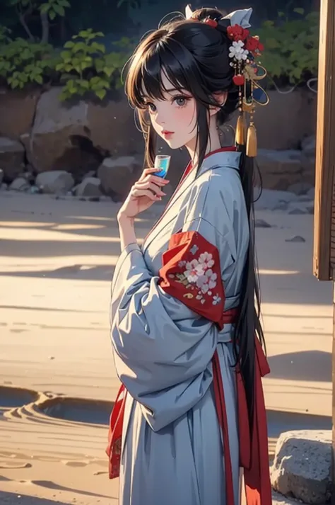 A beautiful woman in a kimono drinking water while standing in the desert