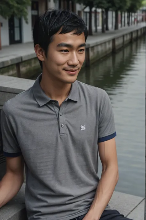 young asian man In a gray polo shirt sitting by the canal with a serious expression, looking into the distance Turn your head sl...