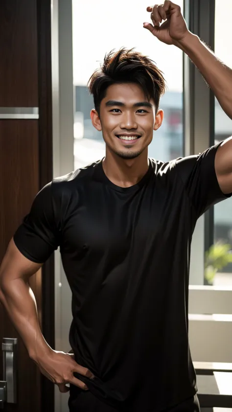 A Thai man, handsome, muscular, with big muscles, wearing a black t-shirt, standing and smiling.