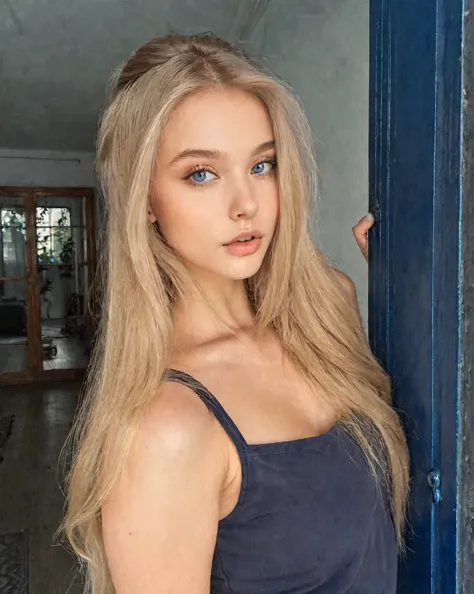 blonde woman with long hair leaning on a blue door, portrait sophie mudd, yelena belova, 18 years, dasha taran, russian bride, b...