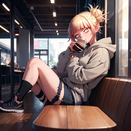 himiko toga, 일본 만화 영화 character from My Hero Academia, 회색 오버사이즈 후드티를 입고, 찢어진 데님 반바지, 그리고 검은색 샌들. She is 좌석 at a modern 카페 table near the window, drinking a cappuccino with a 인정 있는 표현. The 카페 has a cozy atmosphere with wooden furniture and 부드러운 조명. [스타일: 일본 만화 영화, 배경: 카페, 포즈: 좌석, 표현: 인정 있는, 조명: 부드러운]