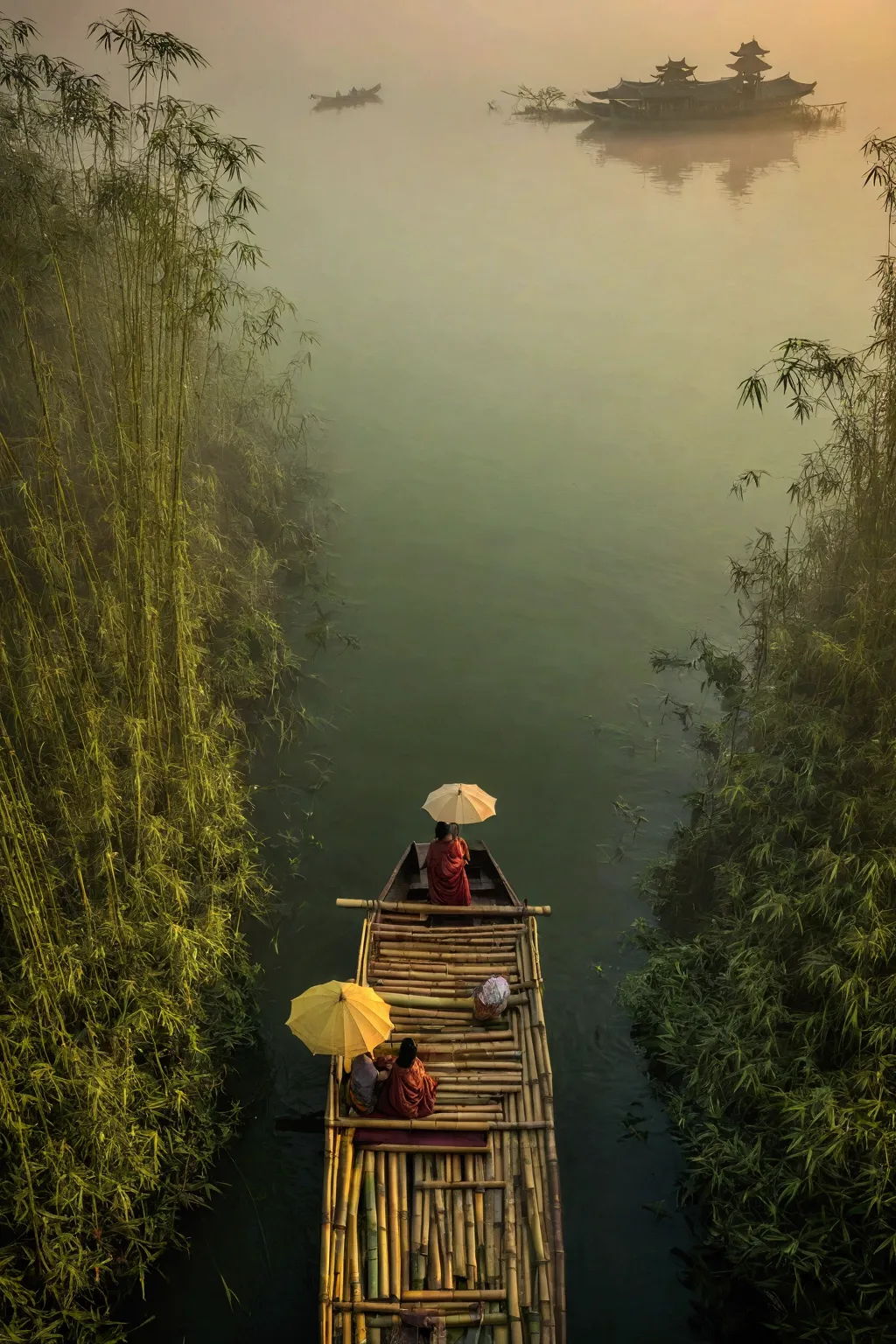 misty，sunset through the fog，aerial view of a bamboo raft，a woman holding an umbrella in front of a bamboo raft，there is a boatm...