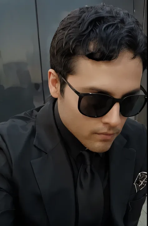 Sunglasses and black suit