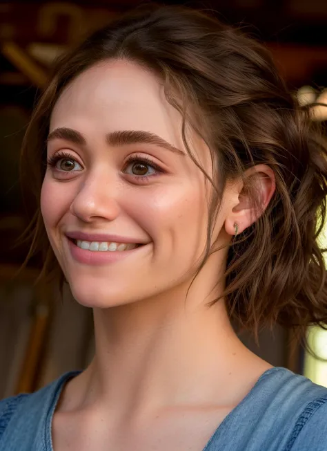 smiling woman with a blue shirt and a white smile on her face