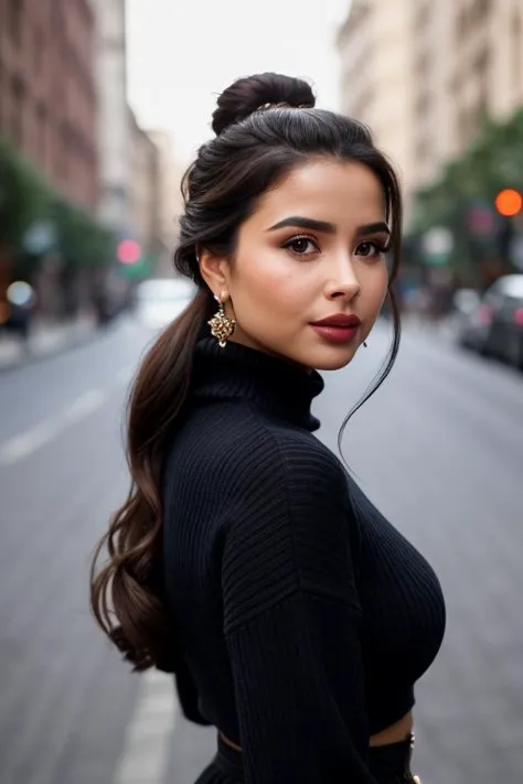 a woman in a black top and skirt standing on a city street