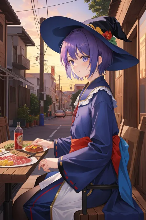 a woman in a witch hat sitting at a table with a pizza