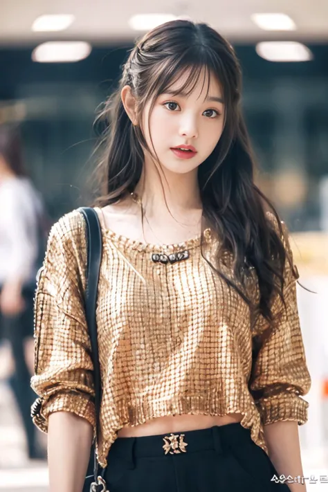 a woman with long hair wearing a gold top and black pants