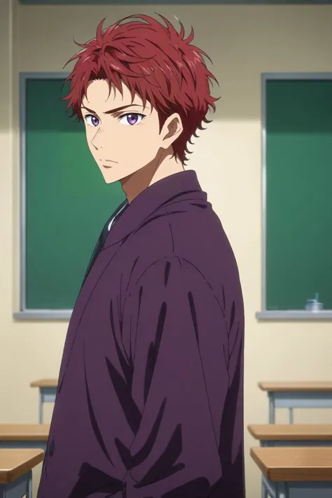 a man with red hair standing in front of a classroom