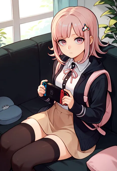 anime girl sitting on a couch holding a game controller