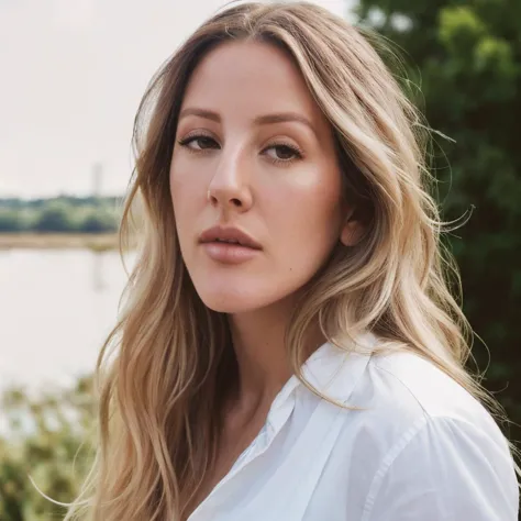 a close up of a woman with long hair and a white shirt