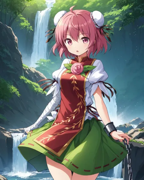 a girl in a green dress standing in front of a waterfall