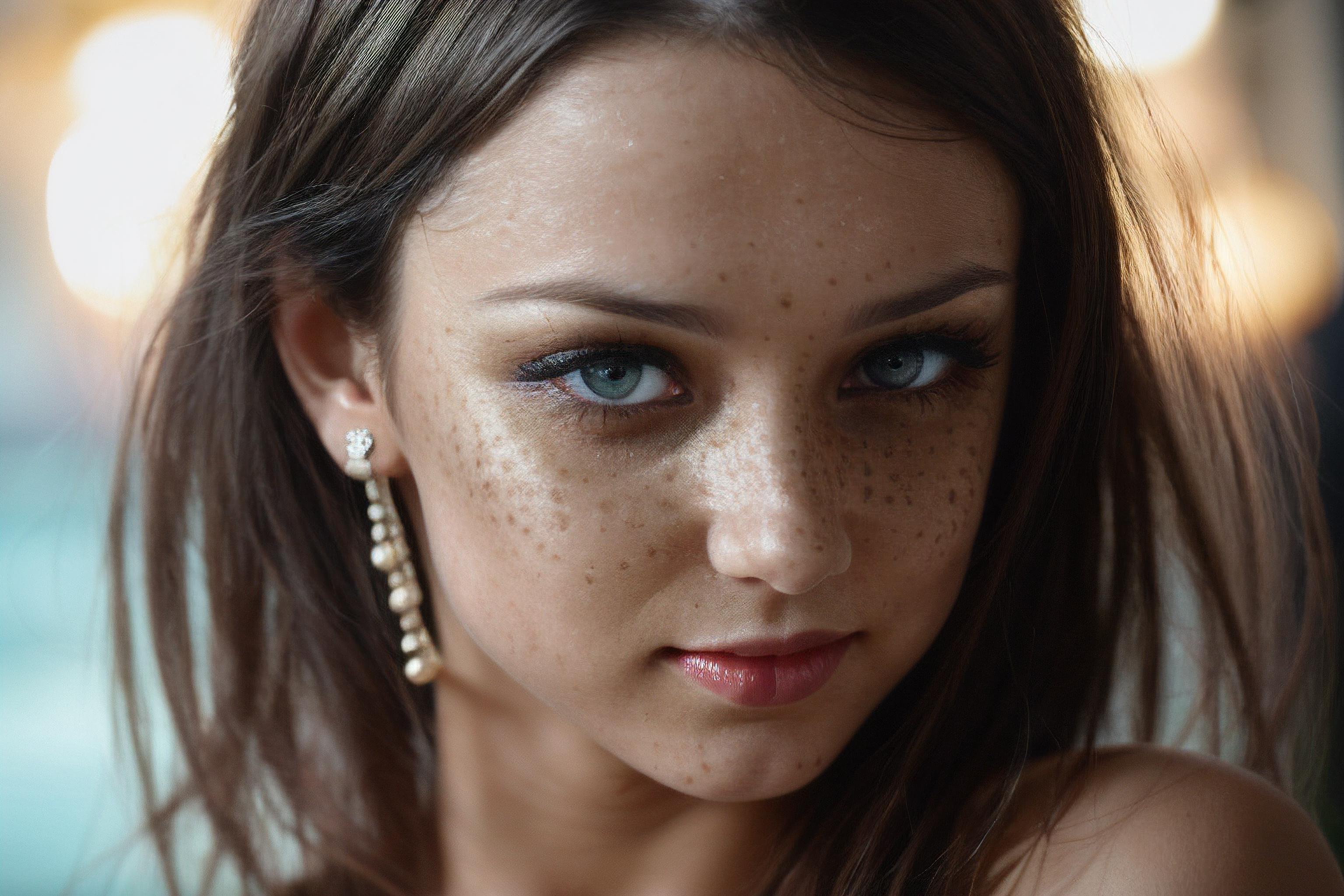 A close up of a woman with freckles and earrings looking at the camera -  SeaArt AI