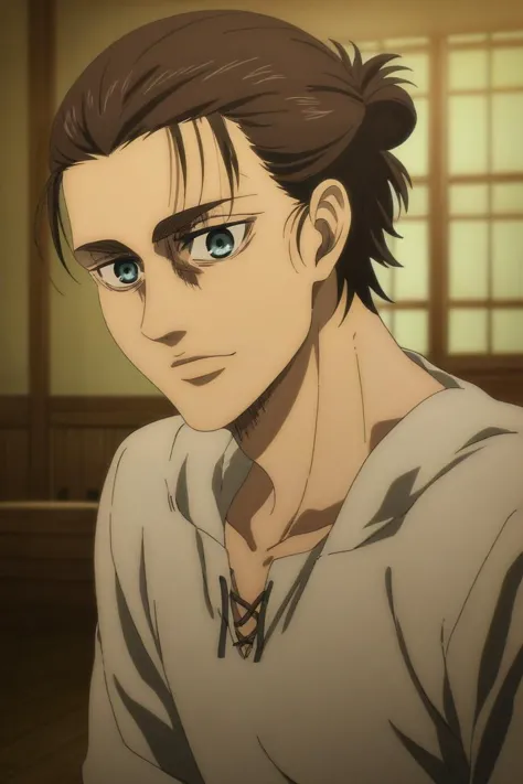 a man with a ponytail and blue eyes looks at the camera