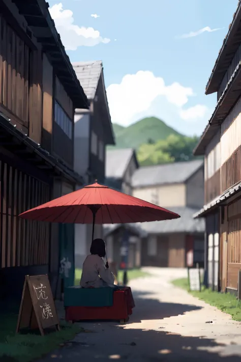 there is a woman sitting under an umbrella on a street