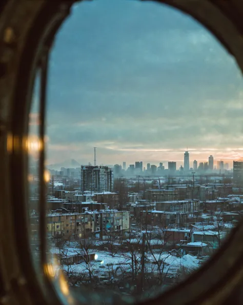 arafed view of a city from a porthole of a building