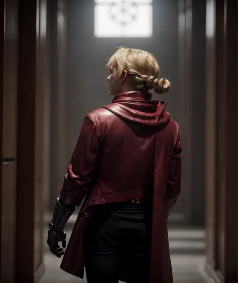 a woman in a red coat and black pants standing in a hallway