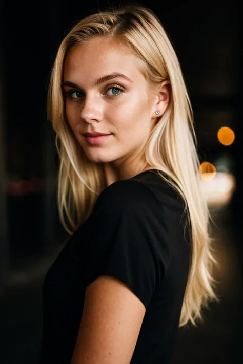 a woman with blonde hair and blue eyes standing in a dark room