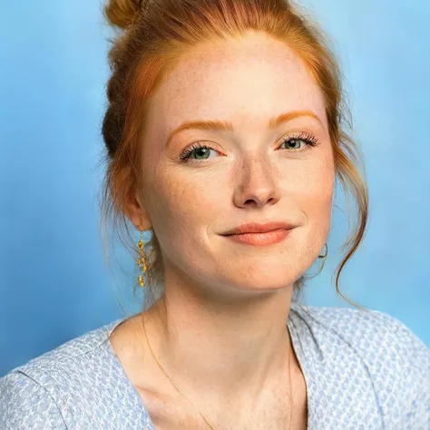 arafed woman with a blue shirt and a blue background