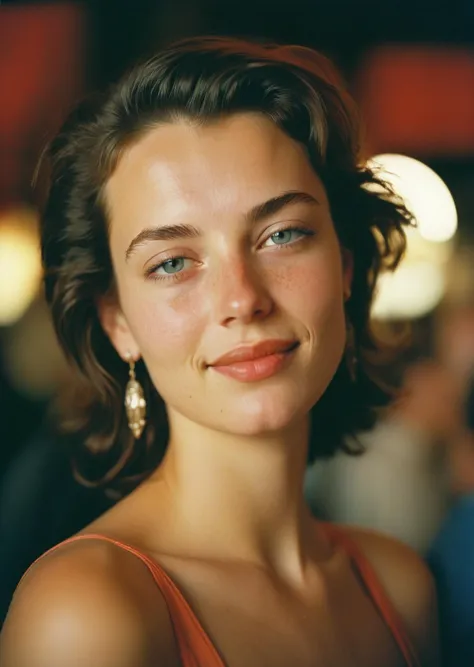 a close up of a woman with a red dress and earrings