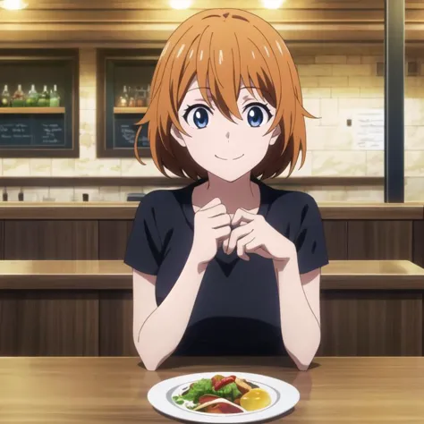 a woman sitting at a table with a plate of food in front of her