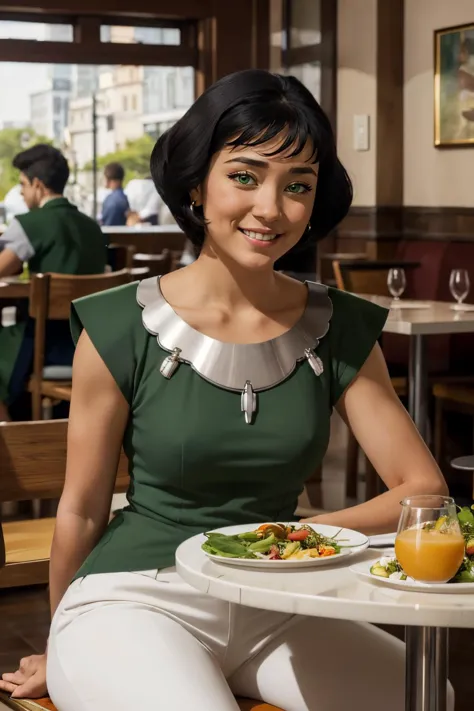 woman sitting at a table with a plate of food and a glass of orange juice