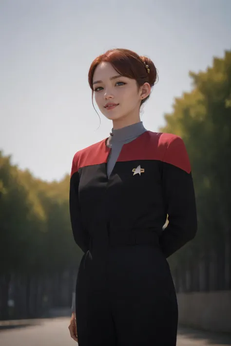 a woman in a star trek uniform poses for a picture